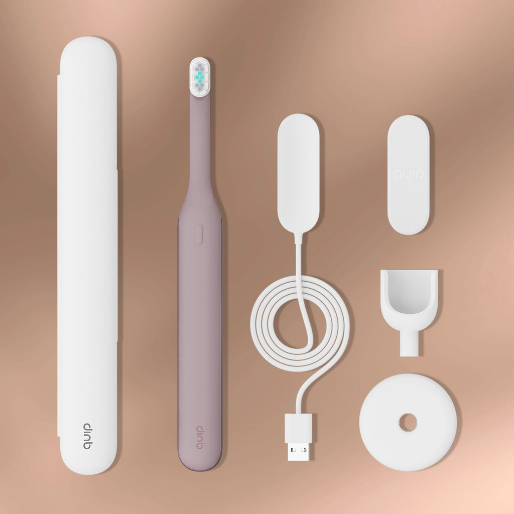 Ultra™ Next Generation Smart Sonic Electric Toothbrush set in Dusk color, shown with travel case, charger cable, mirror mount, and stand.