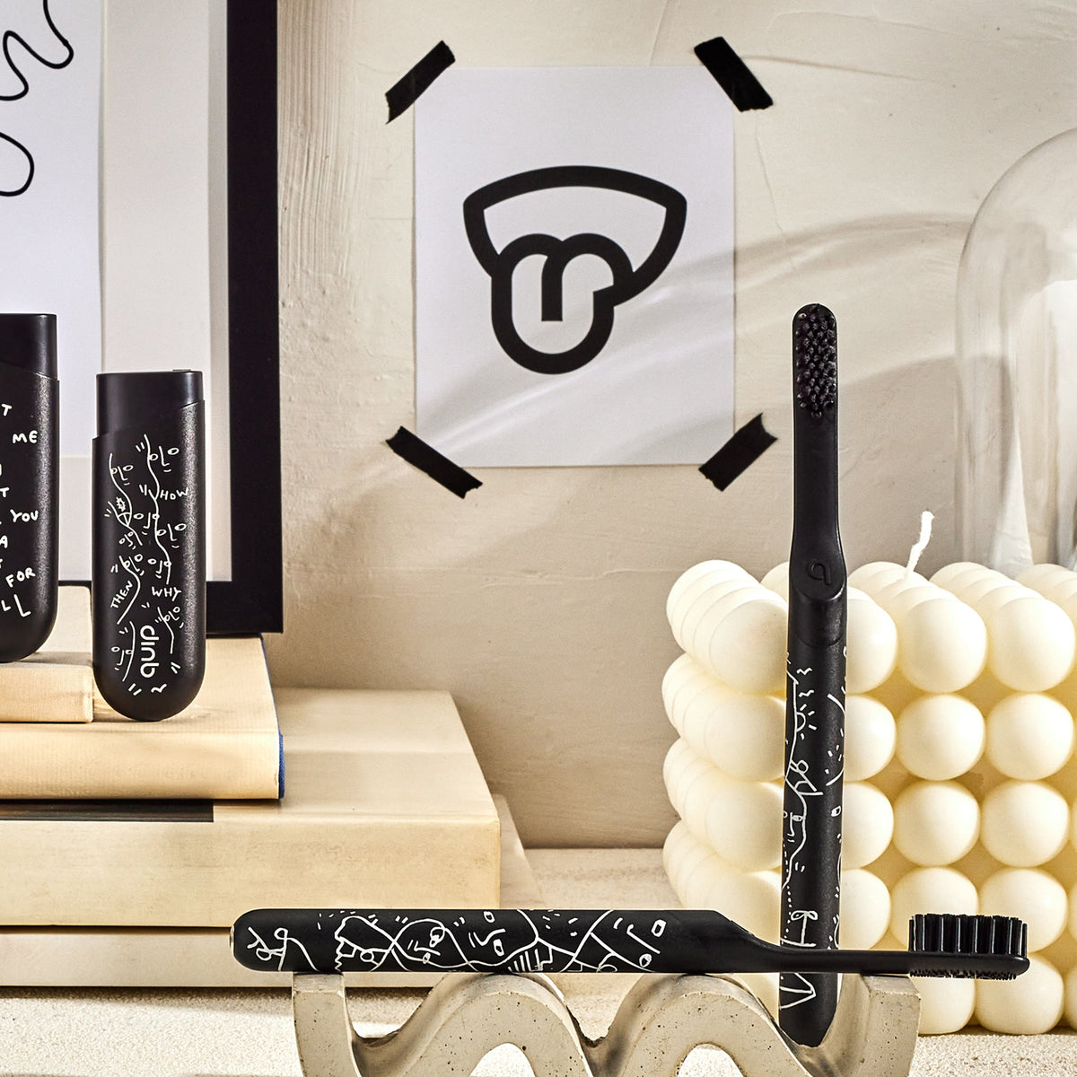 A smart rechargeable sonic toothbrush with a black handle and a geometric pattern, accompanied by a mint dispenser.