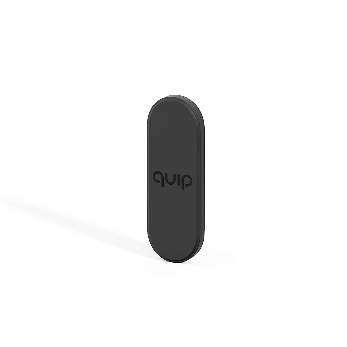 A black quip Ultra Mirror Mount designed to hold a toothbrush on a mirror or other flat surface.
