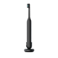 Ultra™ Next Generation Smart Sonic Electric Toothbrush in Onyx color, displayed upright on its matching black stand.
